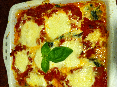 Gegratineerde spinazie met kaas een tomaten. Altijd lekker!