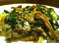 Lasagne van knolselderij met saus van paddenstoelen en gewokte spinazie