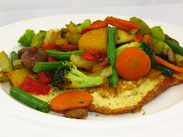 VZL-power-lunch met wokgroente (peen, bleekselderij, broccoli, paprika, maïs en sperziebonen), champignons en chiazaad.